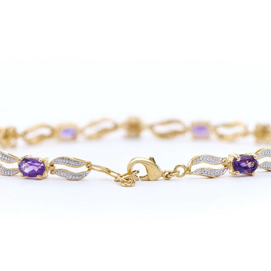 18K yellow gold diamond and amethyst bracelet with oval purple amethysts and round diamonds, 8 inches long