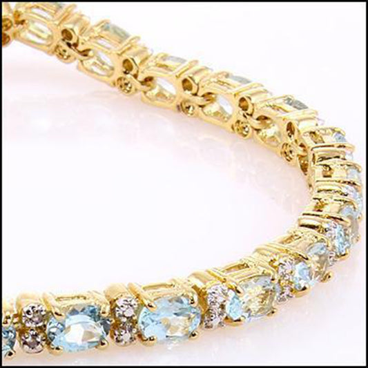 Gorgeous Womens 18K Yellow Gold Over Sterling Silver Diamond and Sky Blue Topaz 7.85 Inch Designer Bracelet