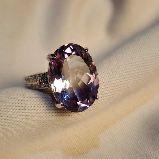 Women's 14K white gold ring with 12 CTW oval amethyst and round diamond accents, size 7