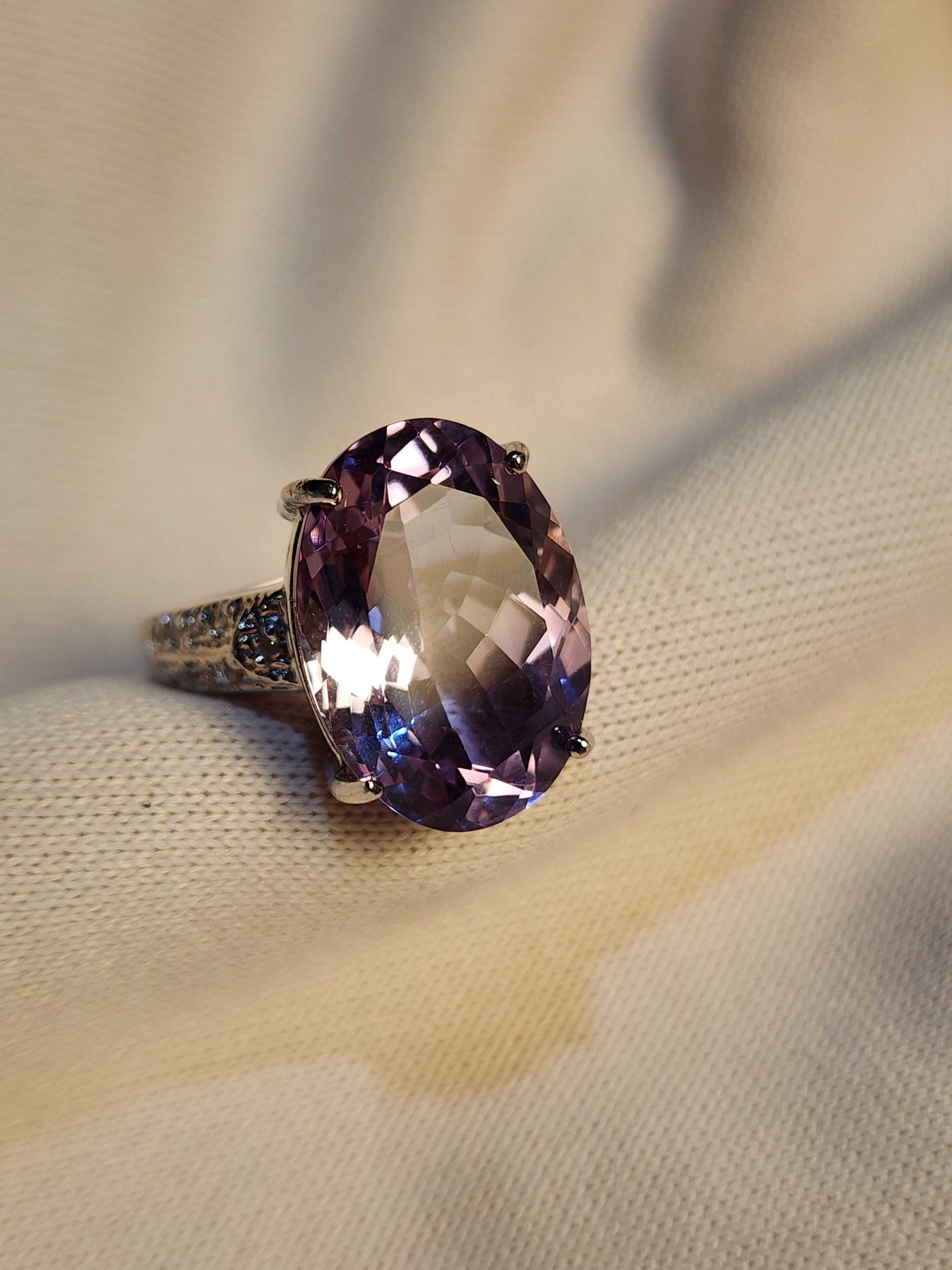 Women's 14K white gold ring with 12 CTW oval amethyst and round diamond accents, size 7