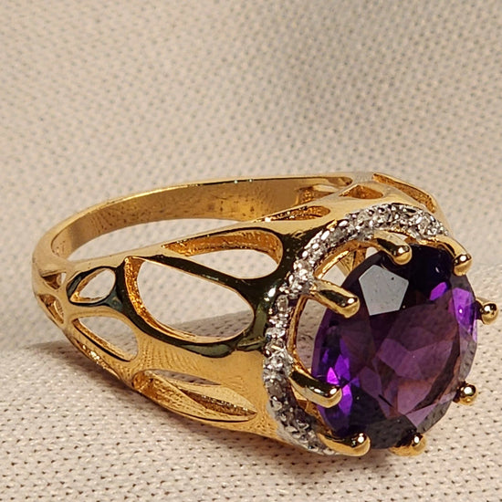 Beautiful amethyst ring with 5.50 CTW purple amethyst and 18 diamond accents in 14K yellow gold plated sterling silver