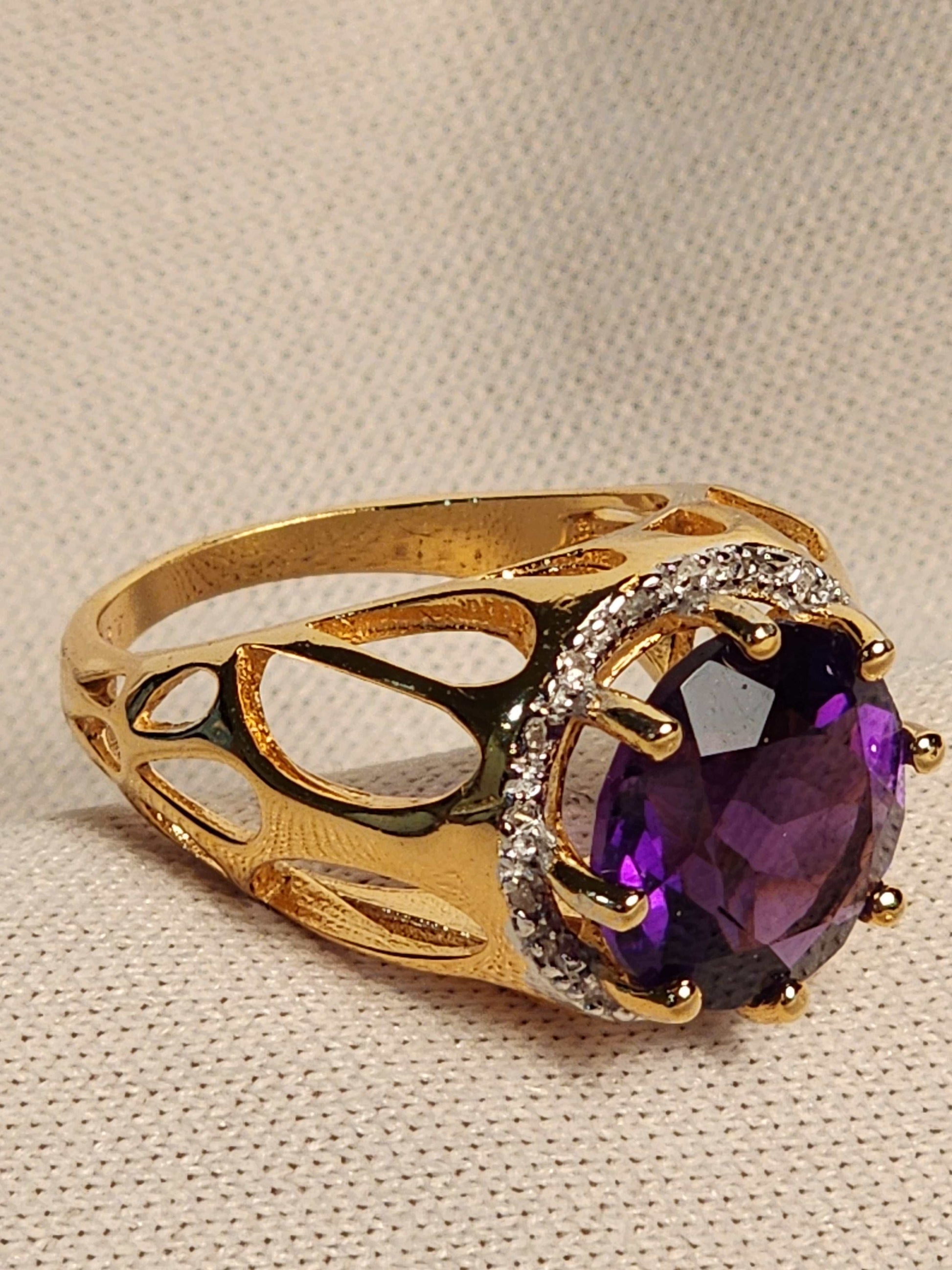 Beautiful amethyst ring with 5.50 CTW purple amethyst and 18 diamond accents in 14K yellow gold plated sterling silver