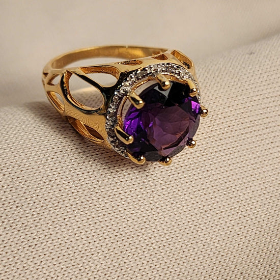 Beautiful amethyst ring with 5.50 CTW purple amethyst and 18 diamond accents in 14K yellow gold plated sterling silver, size 7