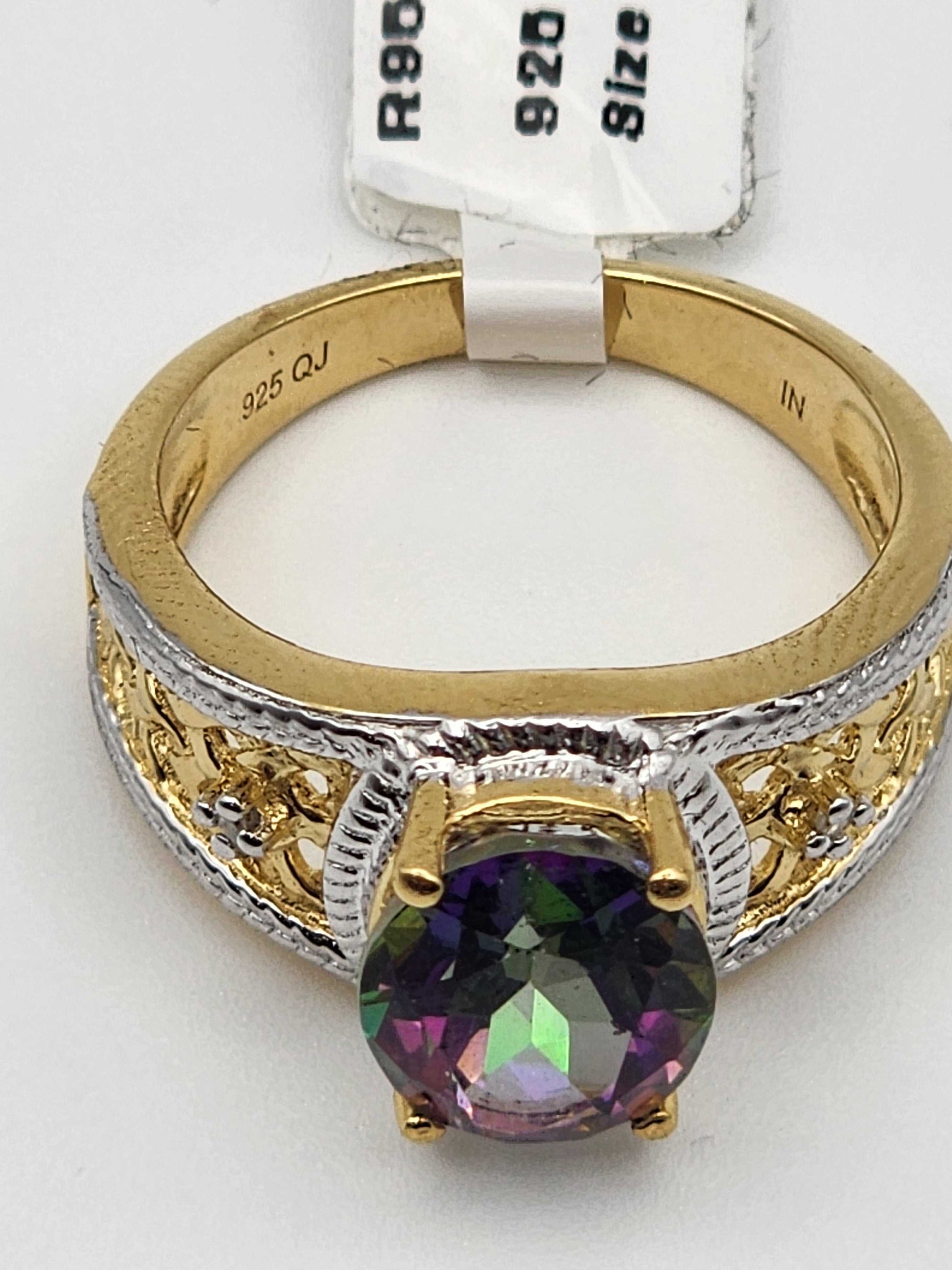 Gorgeous women’s 14K yellow gold mystic topaz and diamond ring, size 7 in sterling silver