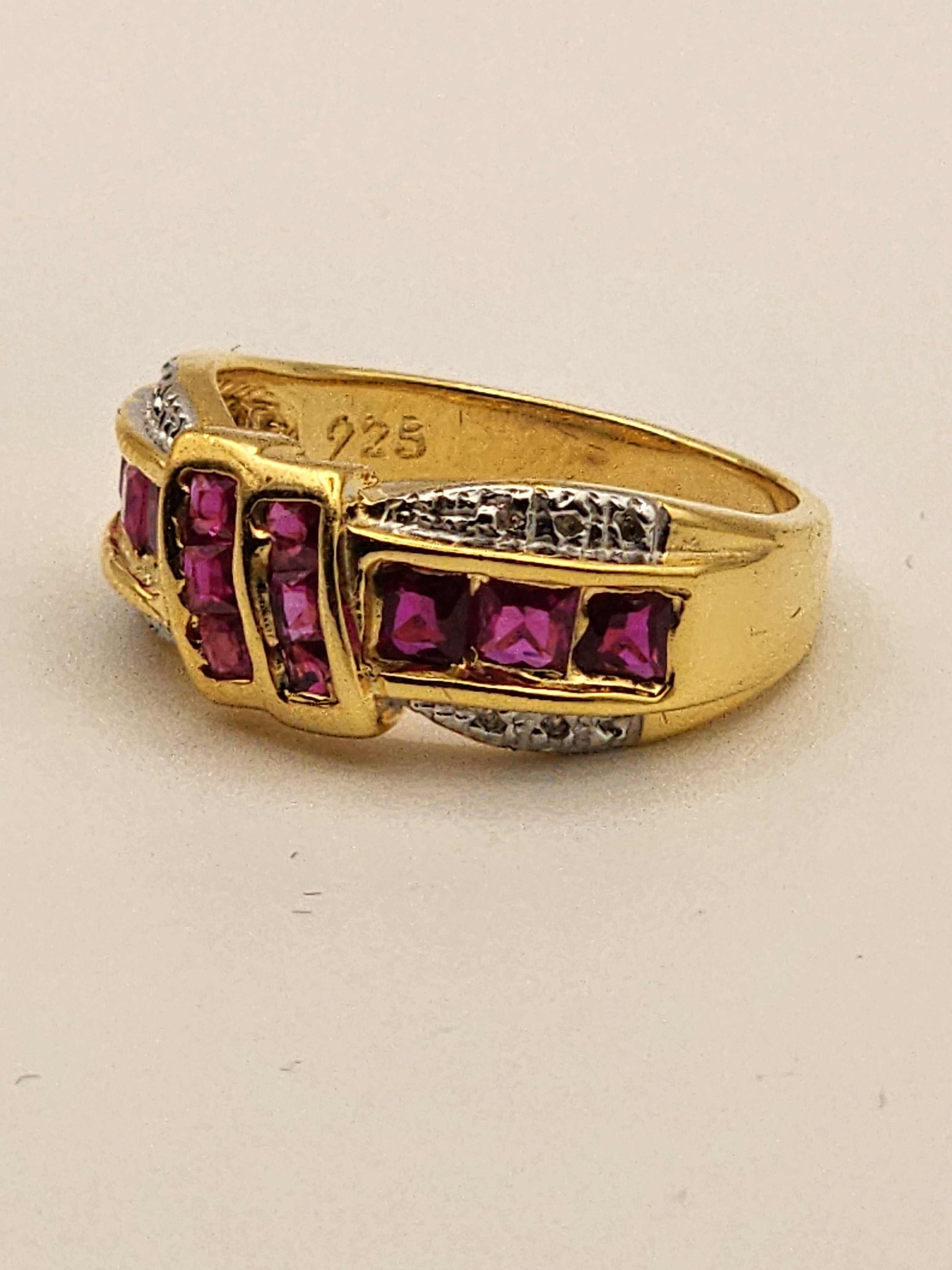 Gorgeous womens ring with 2.5 CTW emerald cut ruby and 12 diamonds in 14K yellow gold layered sterling silver size 7