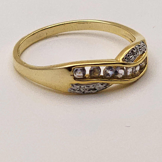 Women’s 14K yellow gold plated sterling silver ring with AAA tanzanite and near-colorless diamonds, size 7.25