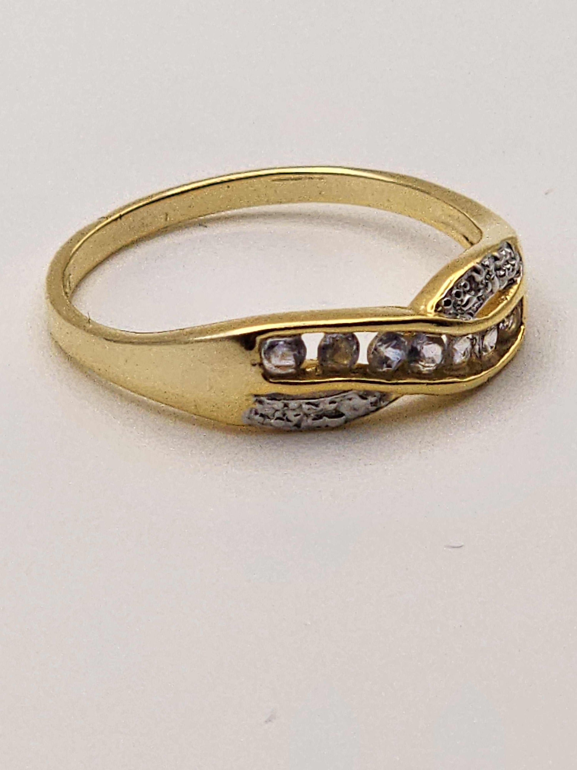 Women’s 14K yellow gold plated sterling silver ring with AAA tanzanite and near-colorless diamonds, size 7.25