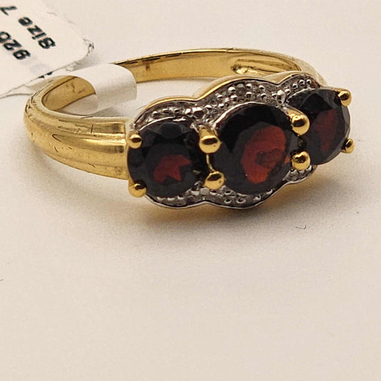 Women’s 14K yellow gold over sterling silver ring with 2.3 carat garnet and diamond, size 7