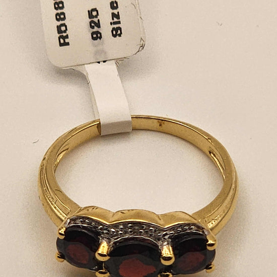 Women’s 14K yellow gold over sterling silver ring with 2.3 carat garnet and diamond, size 7