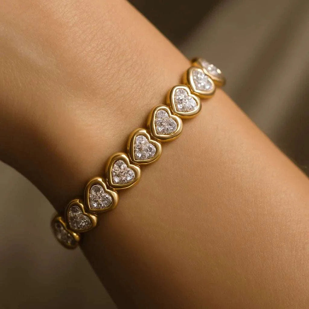 Women's 18K yellow gold plated sterling silver bracelet with diamond-accented hearts