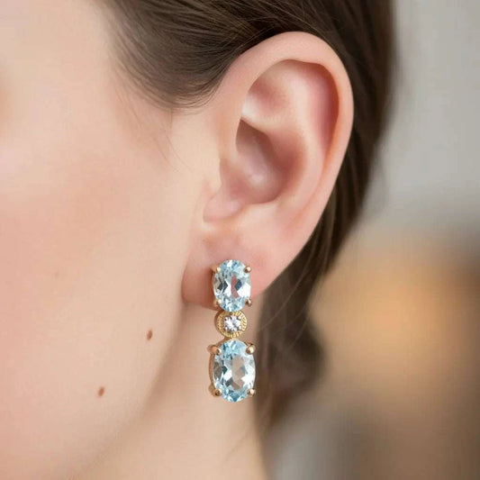 Gorgeous womens earrings featuring 18K yellow gold over sterling silver with Swiss blue topaz and diamonds