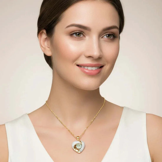 Alluring womens necklace with heart-shaped greenish amethyst and round diamonds in 14K yellow gold over sterling silver
