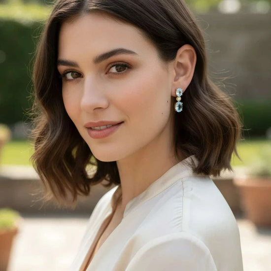 Gorgeous womens earrings featuring 18K yellow gold over sterling silver with Swiss blue topaz and diamonds