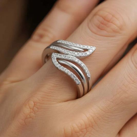 Women’s white gold rhodium diamond ring with round cut diamonds on sterling silver band, size 7