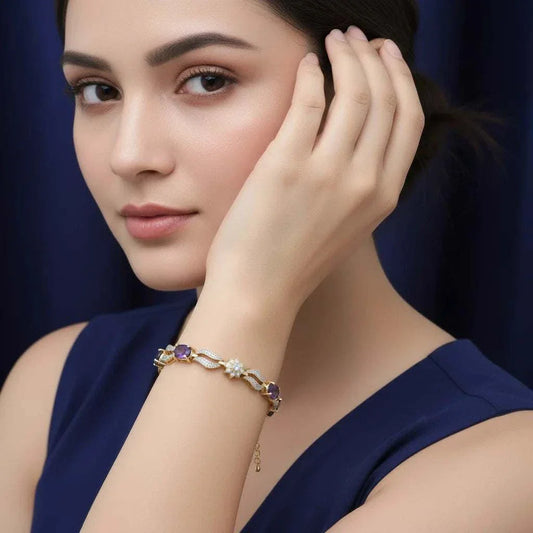 Woman wearing an 8-inch diamond and amethyst bracelet with 18K yellow gold plated sterling silver setting