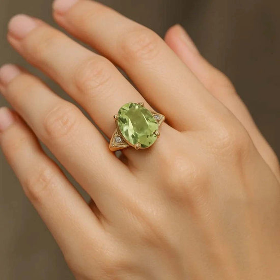 green amethyst and diamond ring with oval-cut gemstone set in 14K gold-plated sterling silver on hand