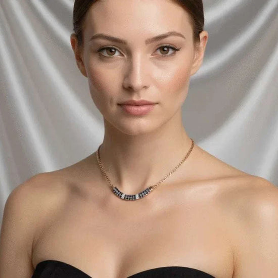 Women’s 18K yellow gold over sterling silver necklace with round-cut sapphires and diamonds worn by woman