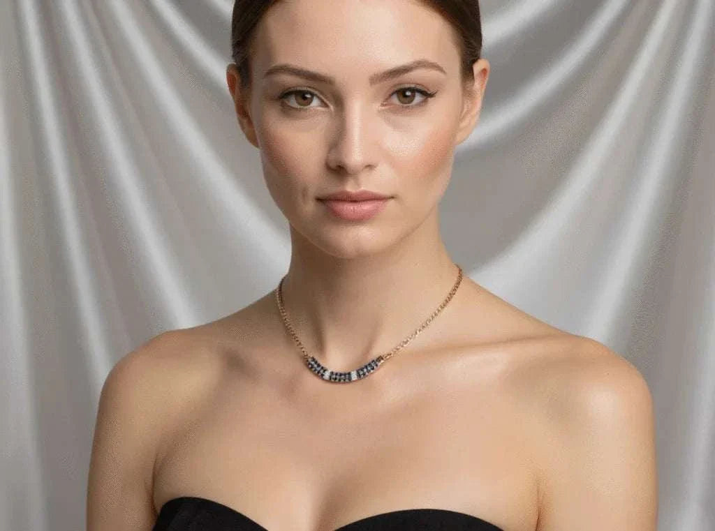 Women’s 18K yellow gold over sterling silver necklace with round-cut sapphires and diamonds worn by woman