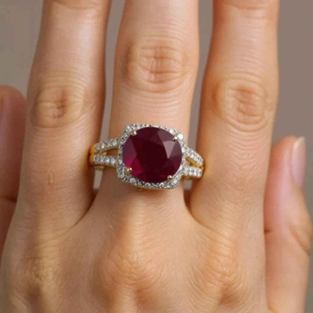 Gorgeous womens ring featuring a 3 CTW oval ruby and 22 round cut diamonds set in 14K yellow gold-plated sterling silver, size 7