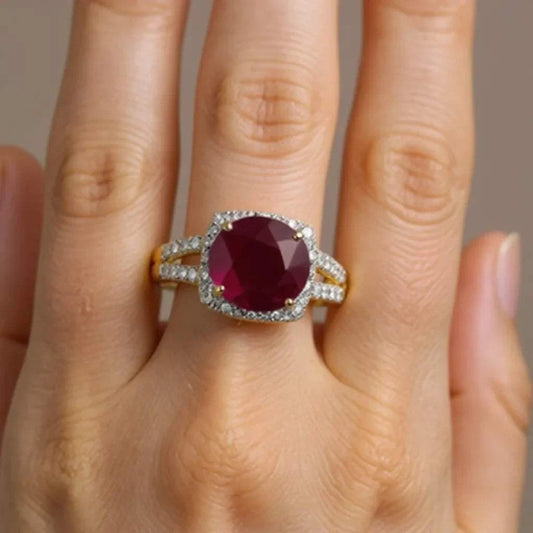 Gorgeous womens ring featuring a 3 CTW oval ruby and 22 round cut diamonds set in 14K yellow gold-plated sterling silver, size 7