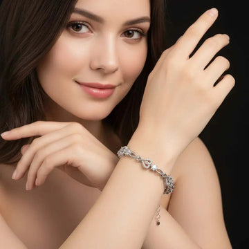 Womens 14K white gold diamond bracelet on model's wrist elegant jewelry accessory