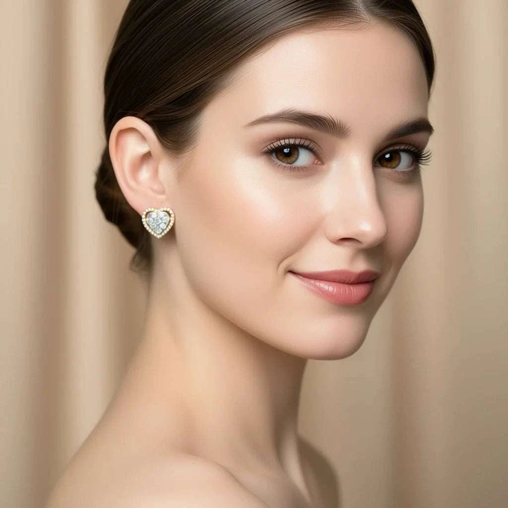 Women’s white gold rhodium plated heart-shaped diamond earrings on model