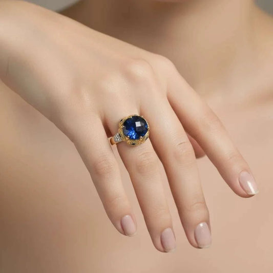 Gorgeous womens 14K yellow gold ring with large blue sapphire and diamond accents on hand size 7