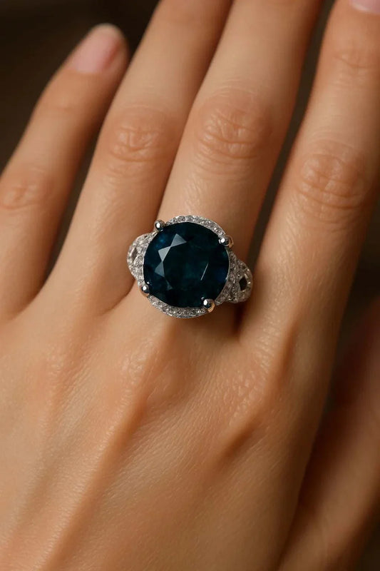 Gorgeous women’s 14K white gold over sterling silver ring with large dark blue gemstone and diamond accents